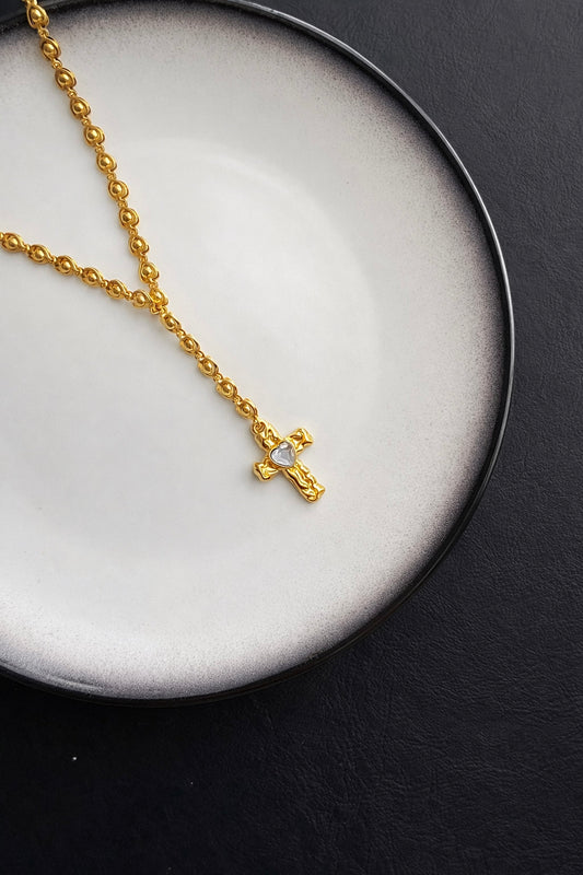 Γυναικείο κολιέ καρδιά από ατσάλι σε χρυσό χρώμα με σταυρό 